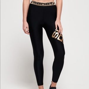 Super dry - Black & Gold Leggings- Size “2”